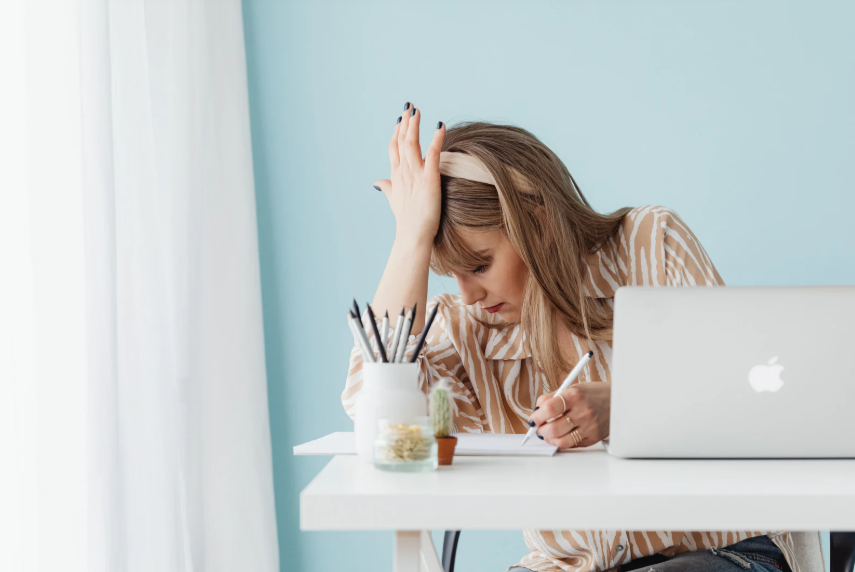 frustrated woman trying to work