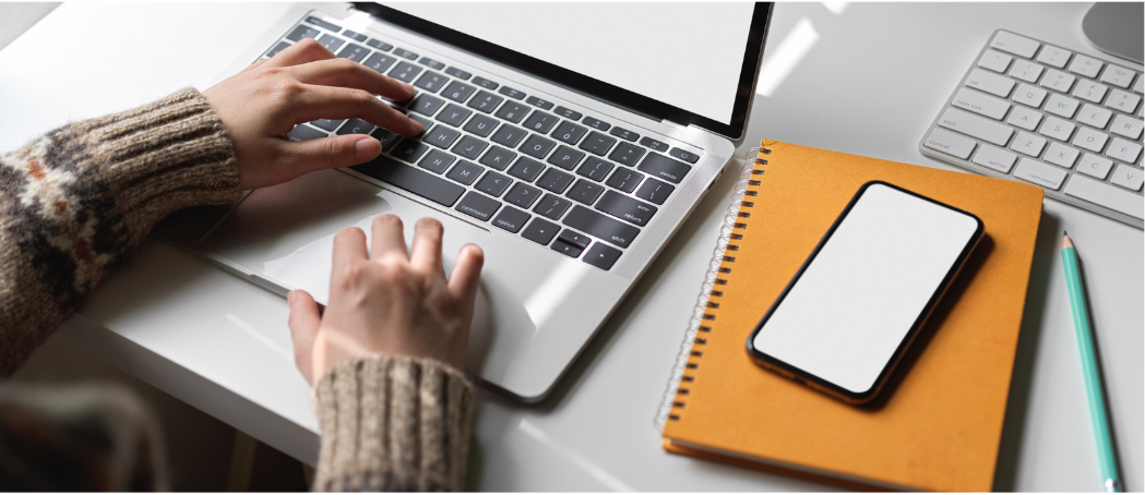 woman typing on keyboard